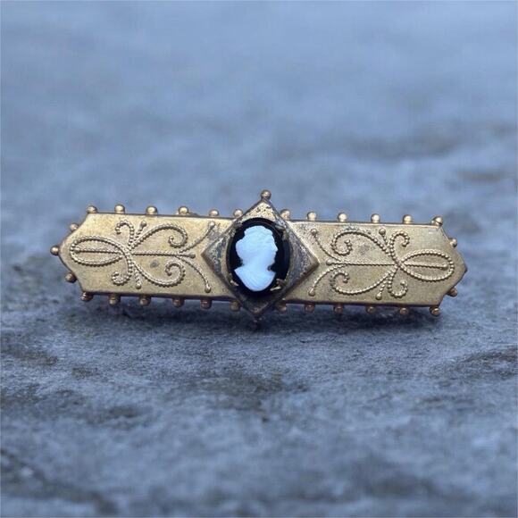 Victorian Gold filled bar pin with cameo on top of black onyx centerpiece